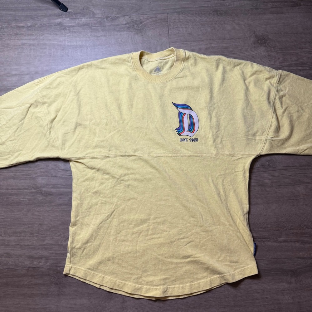 Disney Spirit Jersey Men XS Yellow Disneyland Resort Long Sleeve Graphic Tee